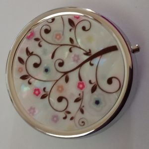 Beautiful floral mirrored divided pill box compact. NWOT